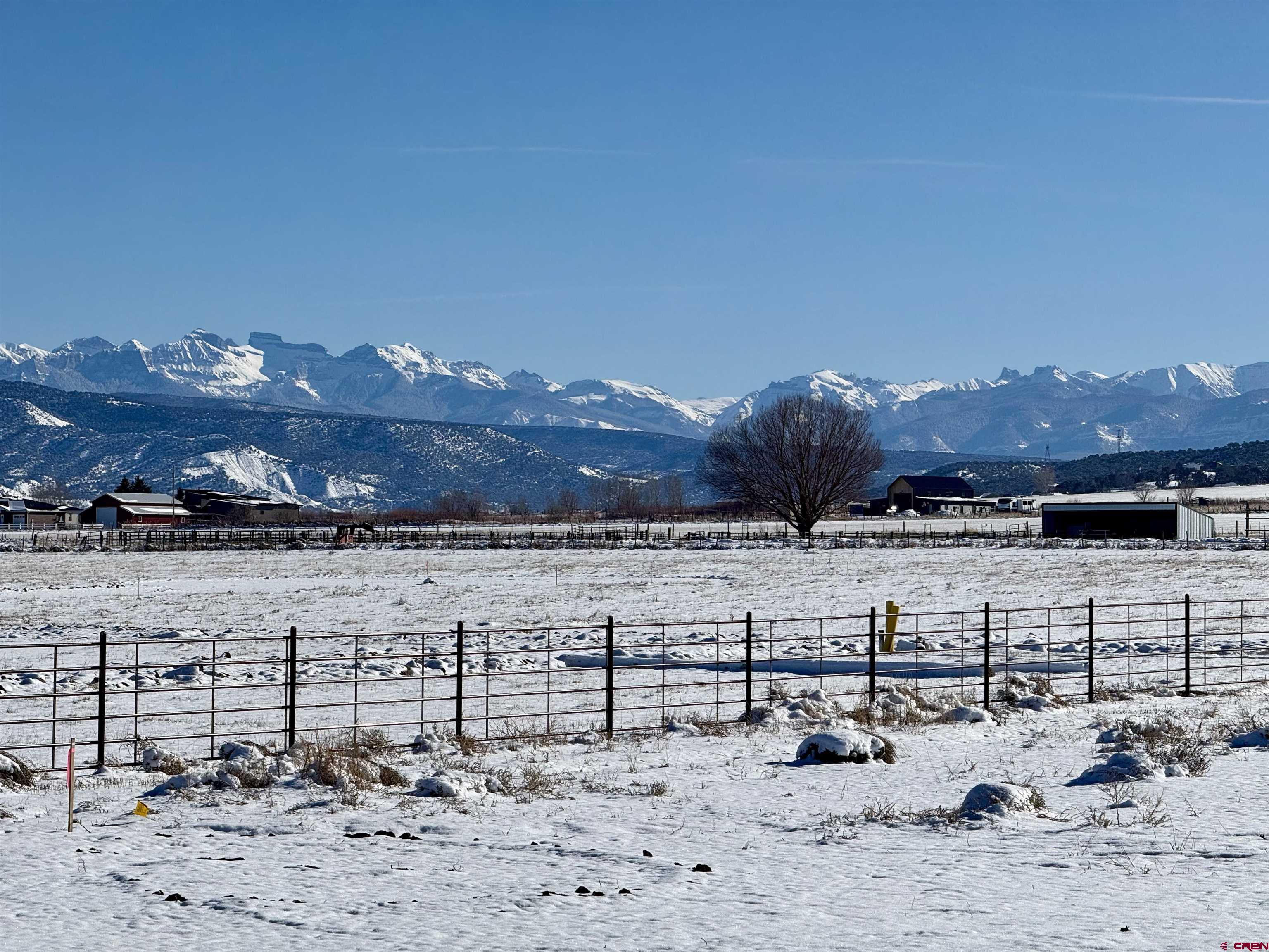 21470 Government Springs Road Montrose, CO 81403 - Photo 22 of 25 a view of a yard with wooden fence