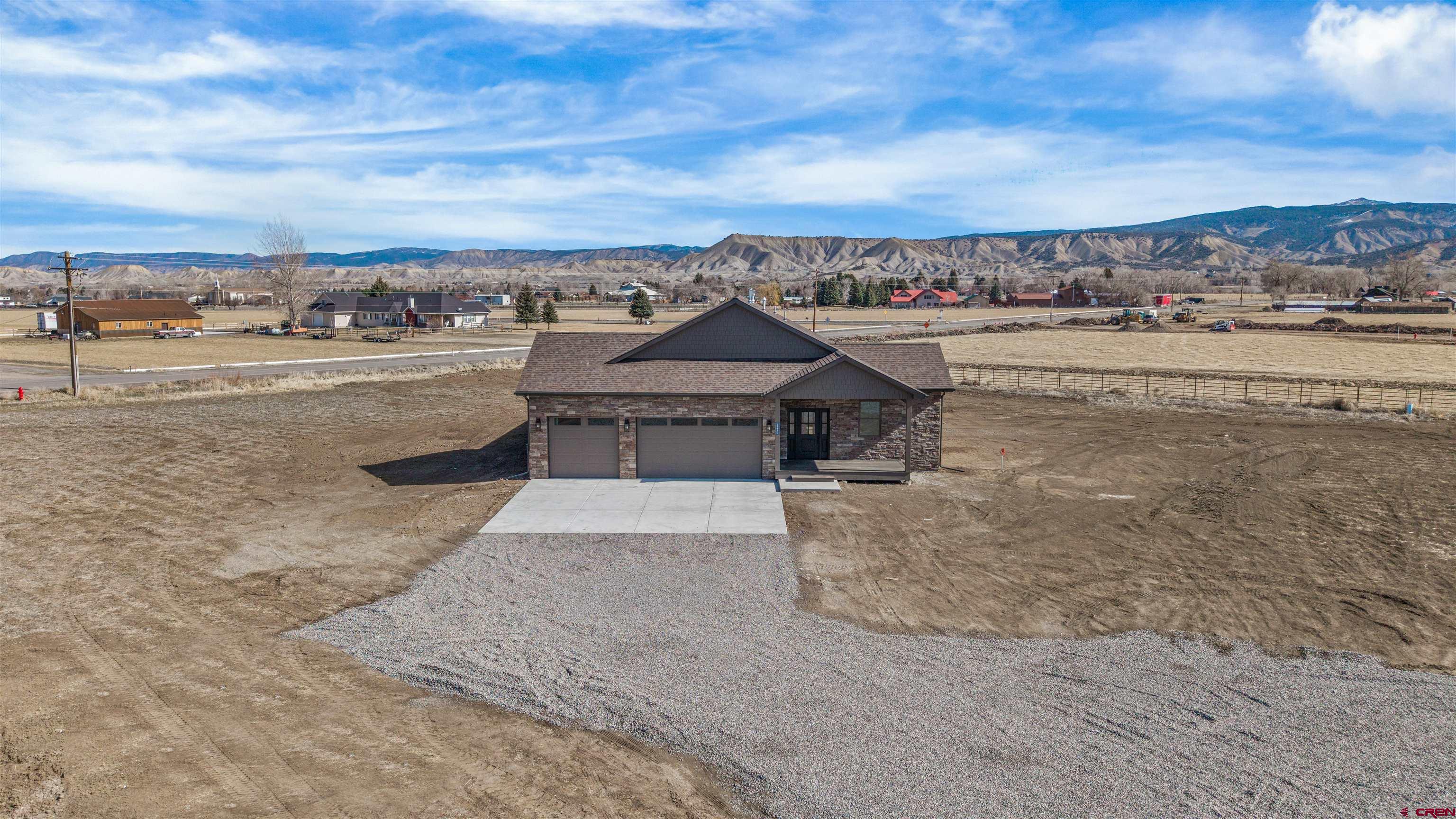 21470 Government Springs Road Montrose, CO 81403 - Photo 7 of 42 a view of a terrace with a bench