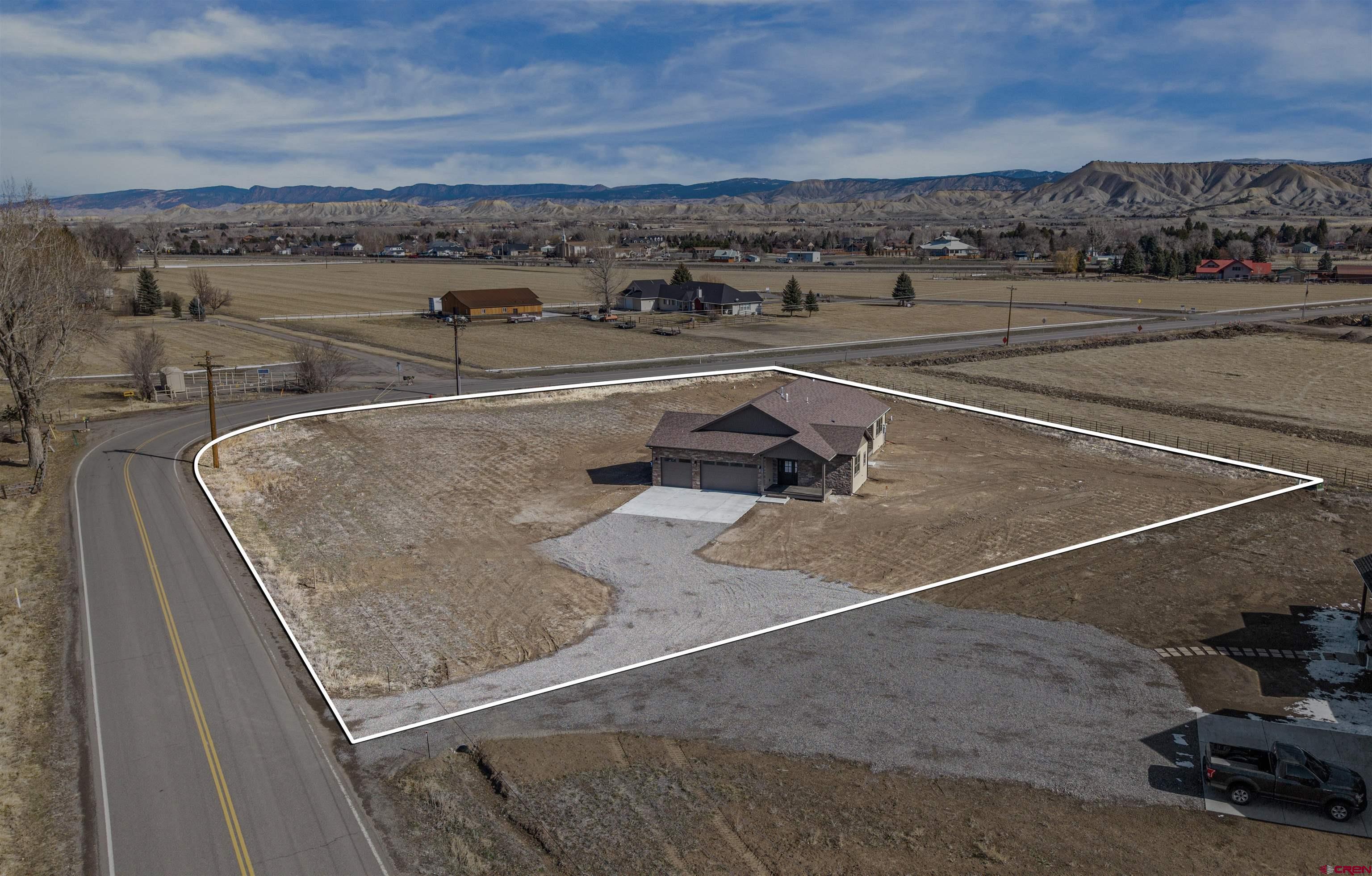 21470 Government Springs Road Montrose, CO 81403 - Photo 8 of 42 a view of outdoor space with seating area