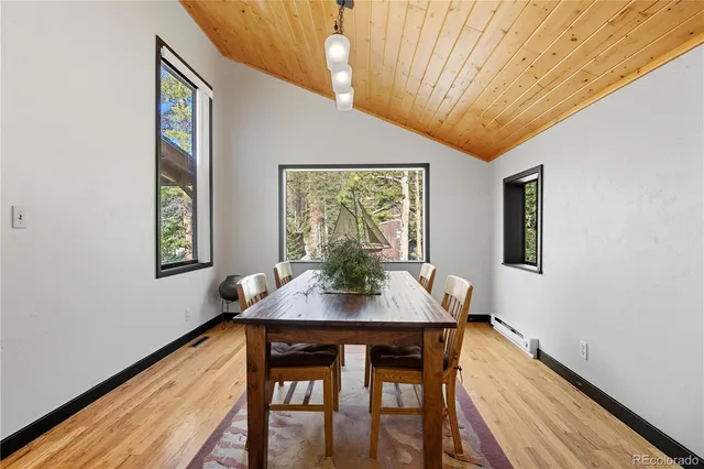 a view of a livingroom with wooden floor