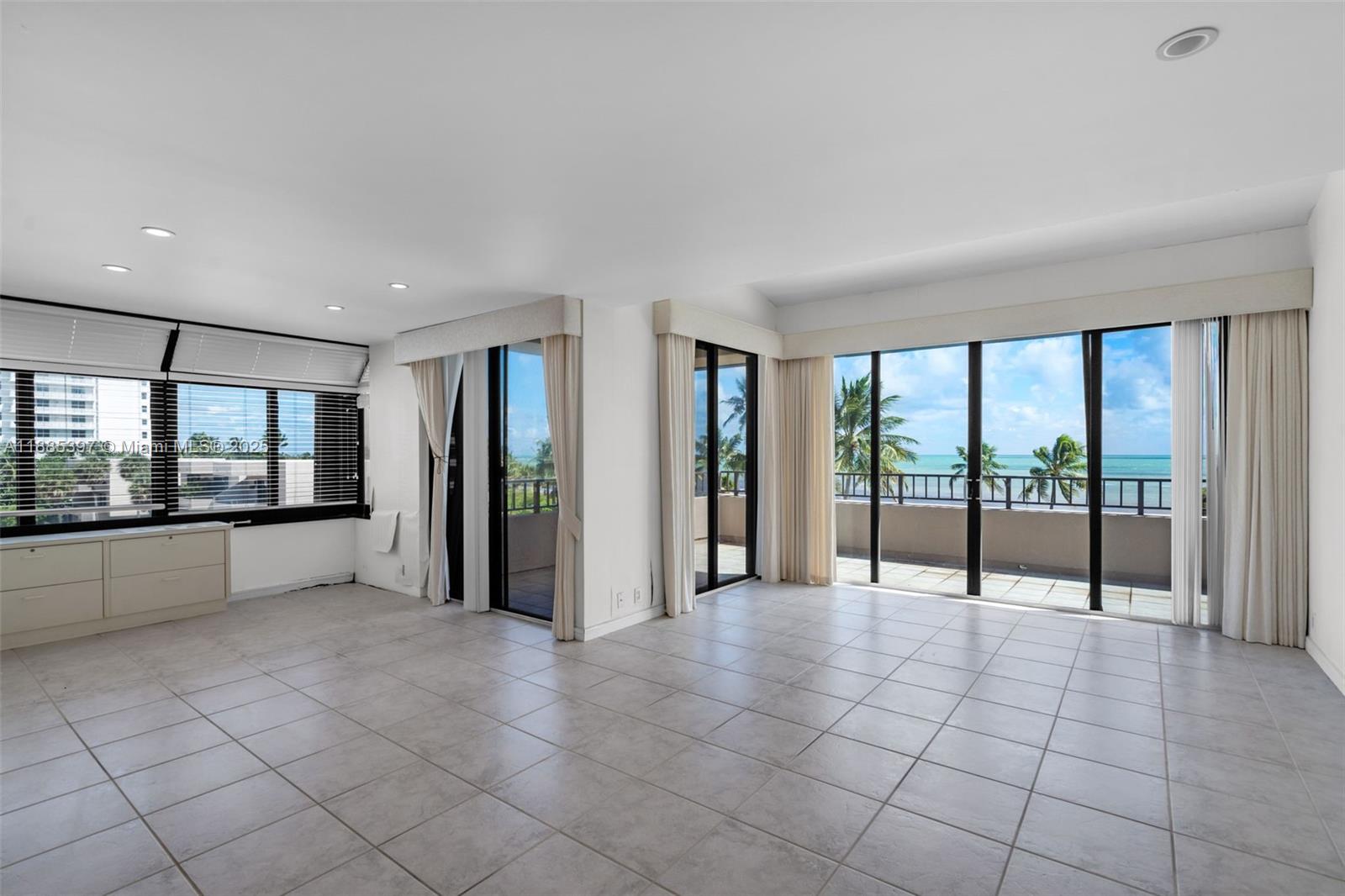 201 Crandon Boulevard, Unit 444 Key Biscayne, FL 33149 - Photo 8 of 47 Living/Dining Room With Direct Ocean Views