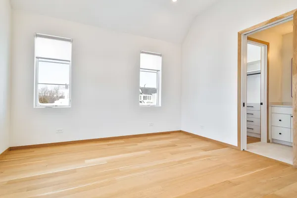 a view of an empty walk in closet