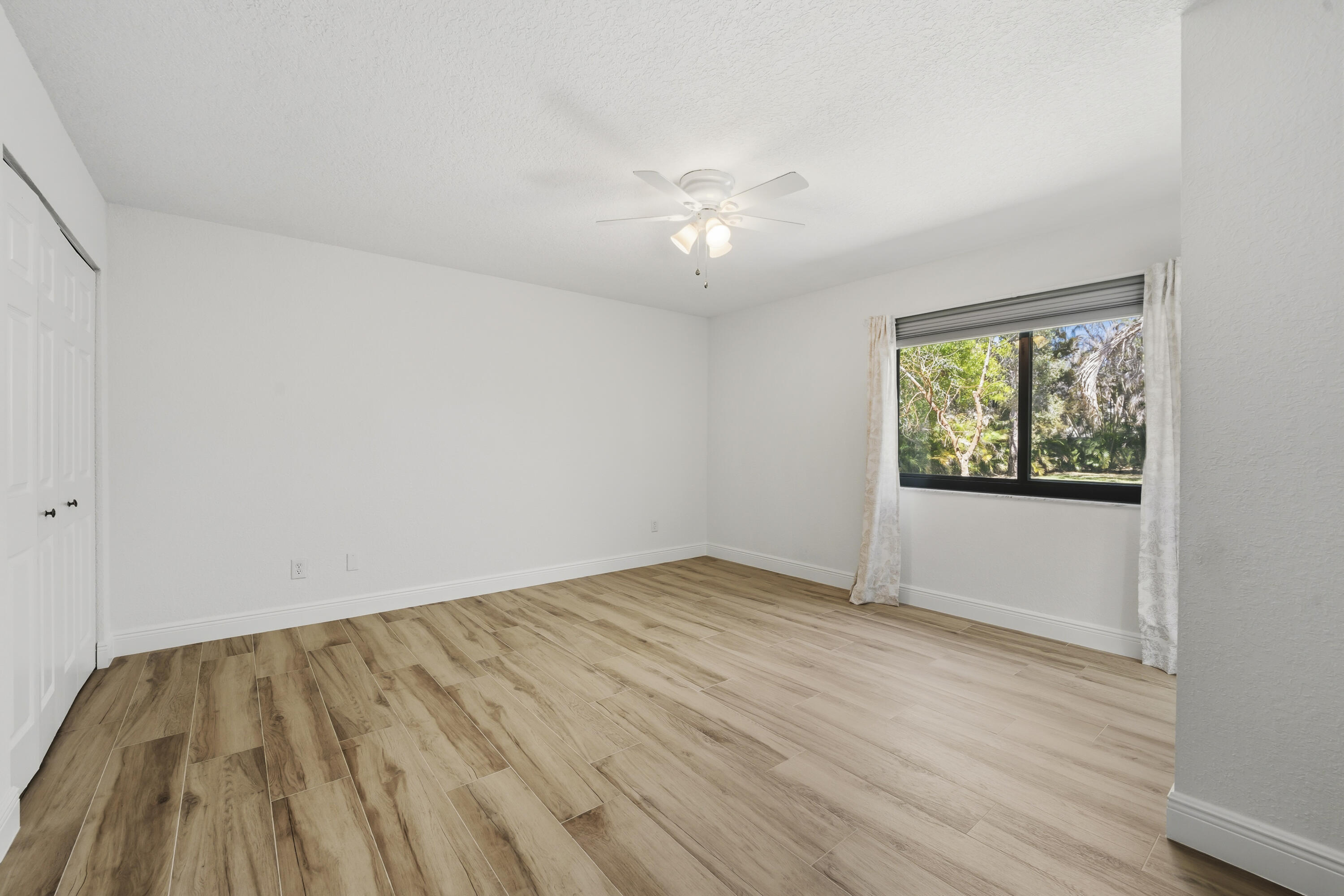 2225 Southeast Flanders Road Port St. Lucie, FL 34952 - Photo 23 of 45 Primary Bedroom