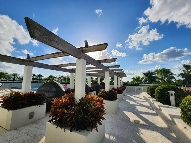 a living room with patio furniture