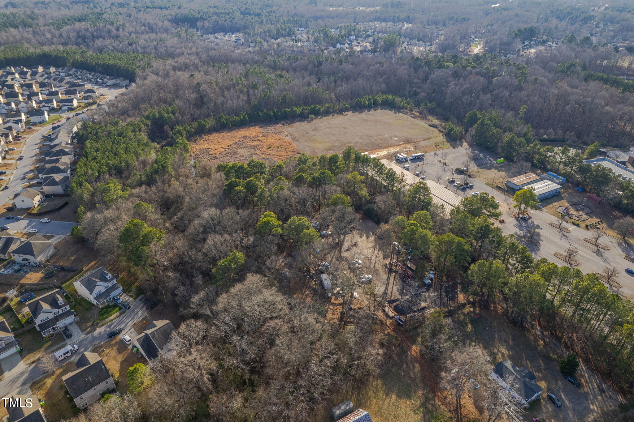 3030 Rock Quarry Road Raleigh, NC 27610 - Photo 12 of 15 a view of a backyard of a house