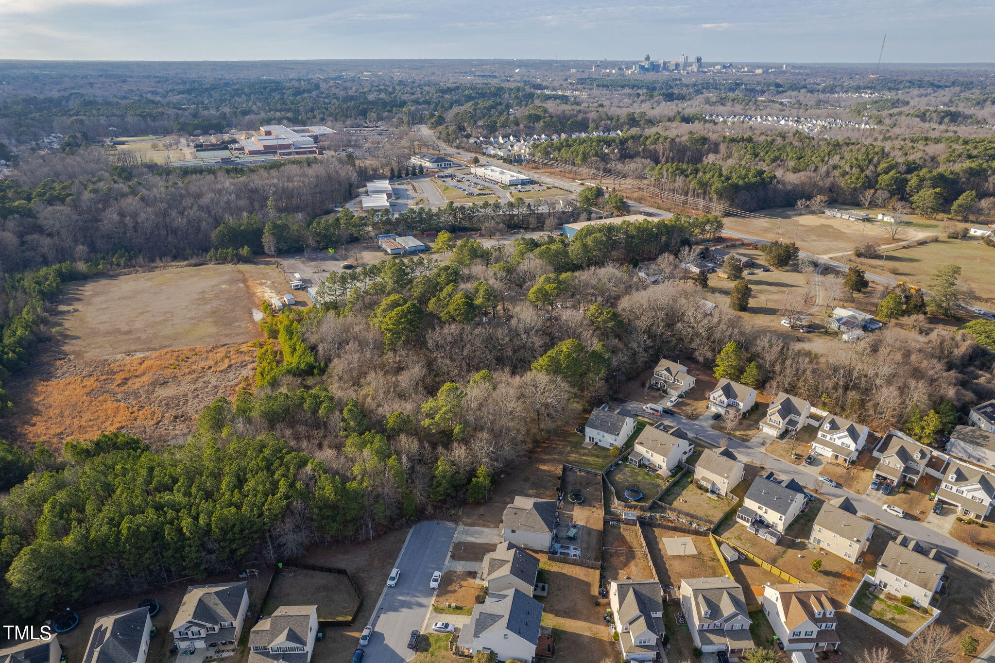 3030 Rock Quarry Road Raleigh, NC 27610 - Photo 2 of 15 an aerial view of multiple house
