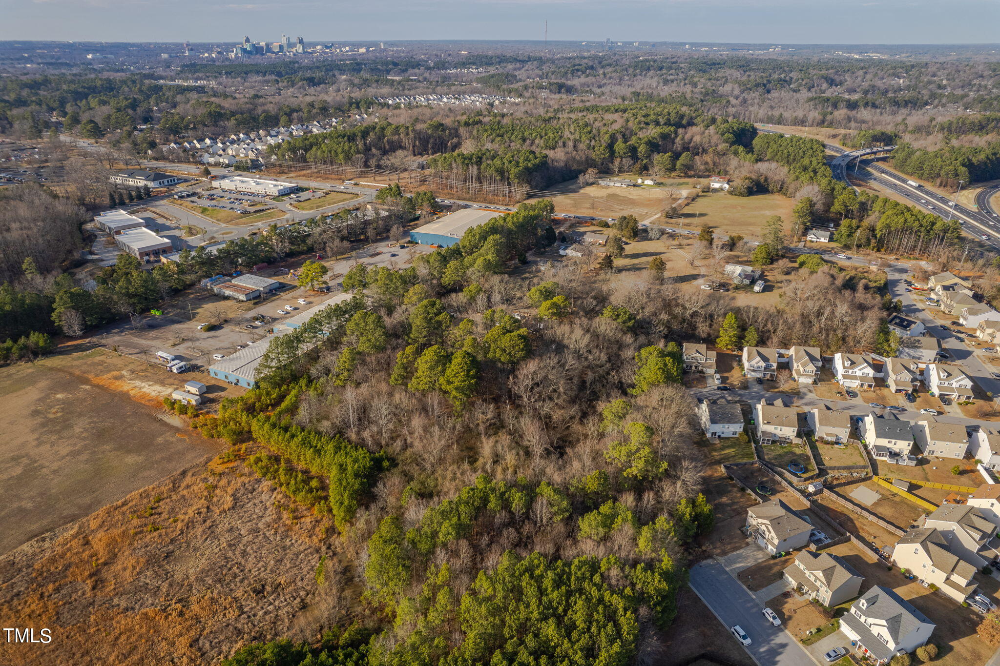 3030 Rock Quarry Road Raleigh, NC 27610 - Photo 4 of 15 an aerial view of multiple house