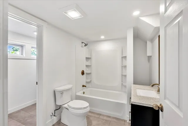 a house view with a backyard space