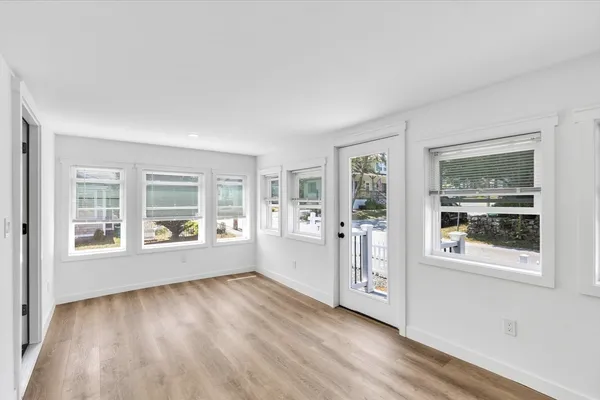 a kitchen with stainless steel appliances a refrigerator and a stove top oven