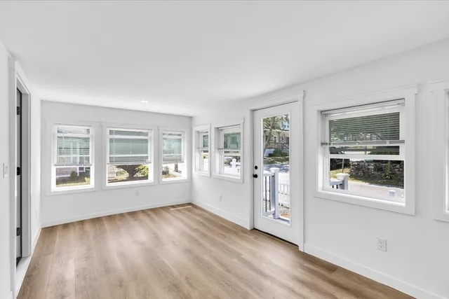 a kitchen with stainless steel appliances a refrigerator and a stove top oven