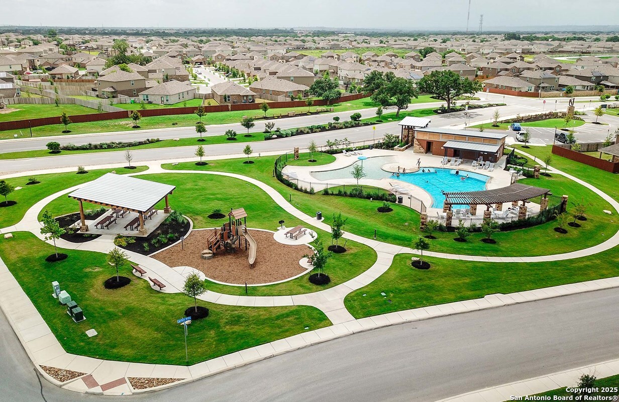 11264 Long Rider San Antonio, TX 78254 - Photo 10 of 11 an aerial view of a house with yard swimming pool and outdoor seating