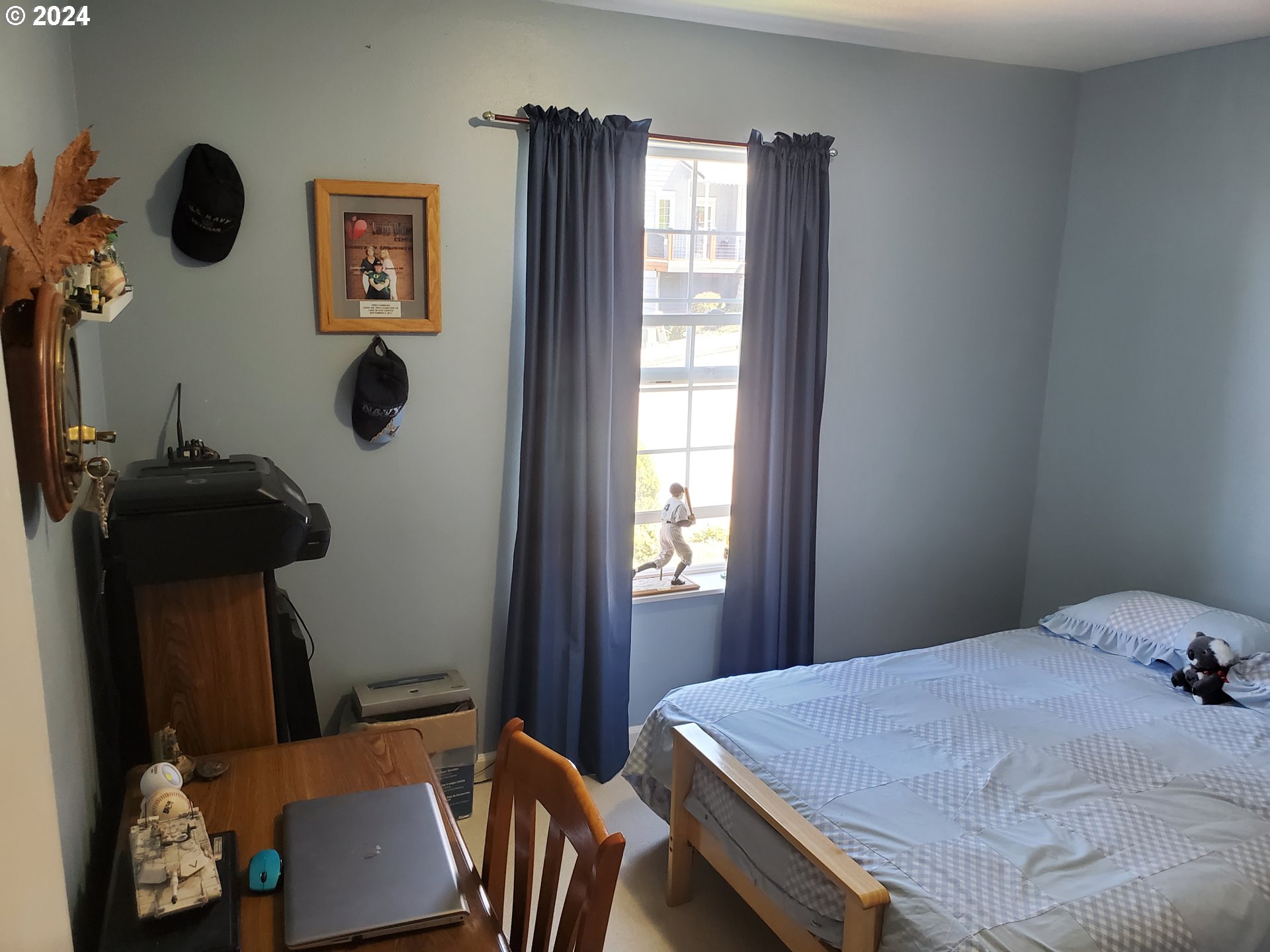 952 South 67th Street Springfield, OR 97478 - Photo 25 of 44 a bedroom with a bed and a window