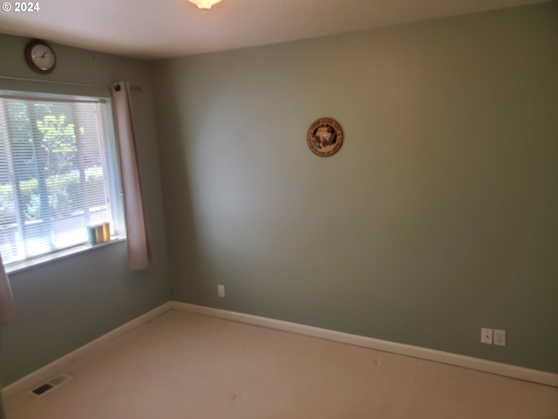 952 South 67th Street Springfield, OR 97478 - Photo 27 of 44 a view of a window in an empty room