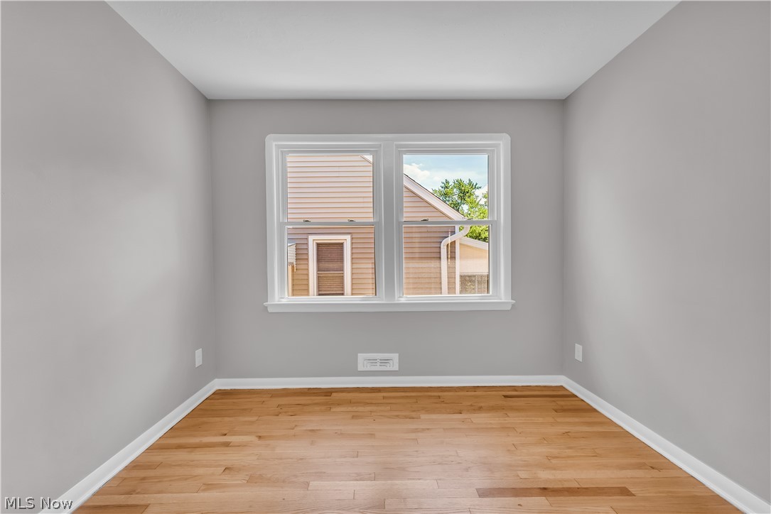 4322 Roadoan Road Brooklyn, OH 44144 - Photo 15 of 27 Spare room featuring light wood-type flooring