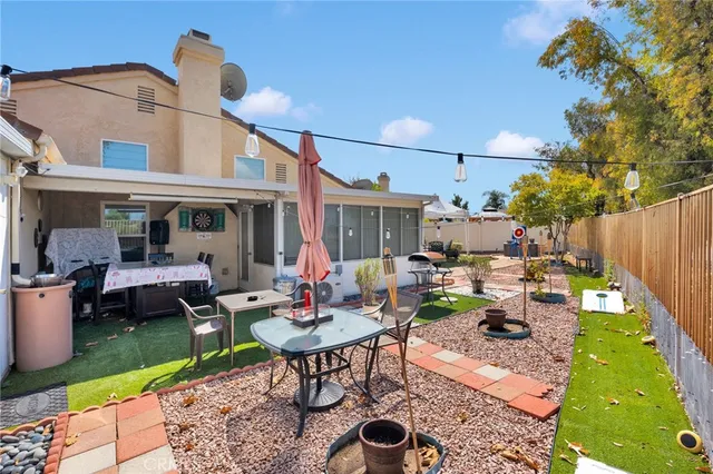 a view of a terrace with furniture