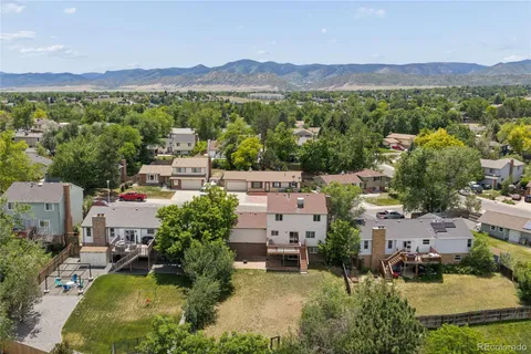 an aerial view of a house with a garden
