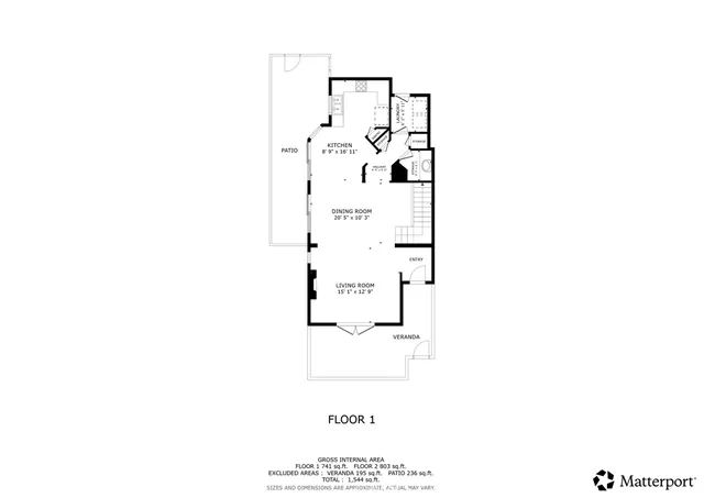 a view of a chairs and table in the backyard