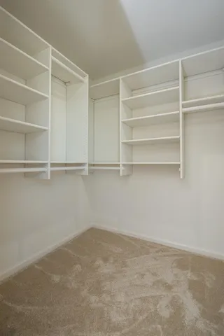 a view of an empty walk in closet