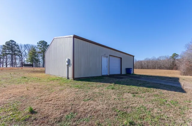 a house view with a backyard space