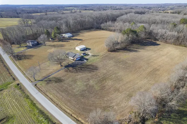 a view of a backyard of a house