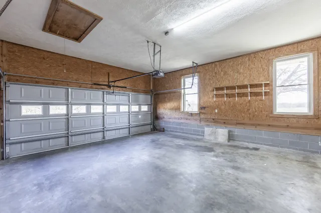 en empty room with windows