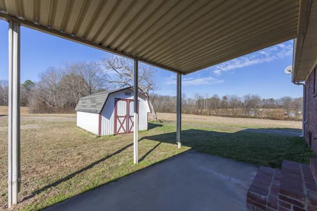 a view of a back yard of the house