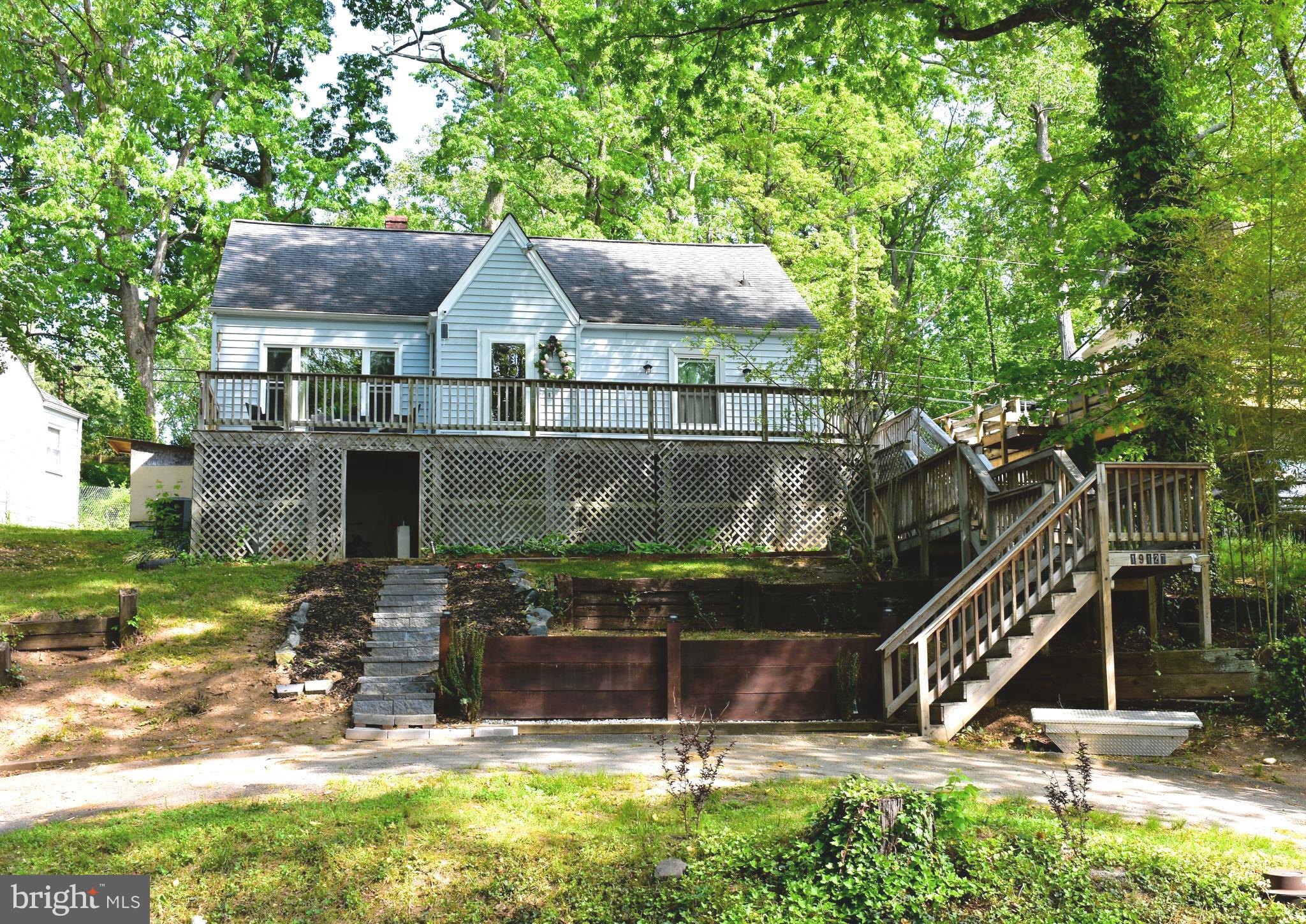 19127 Windsor Road Triangle, VA 22172 - Photo 2 of 33 a view of house with a yard