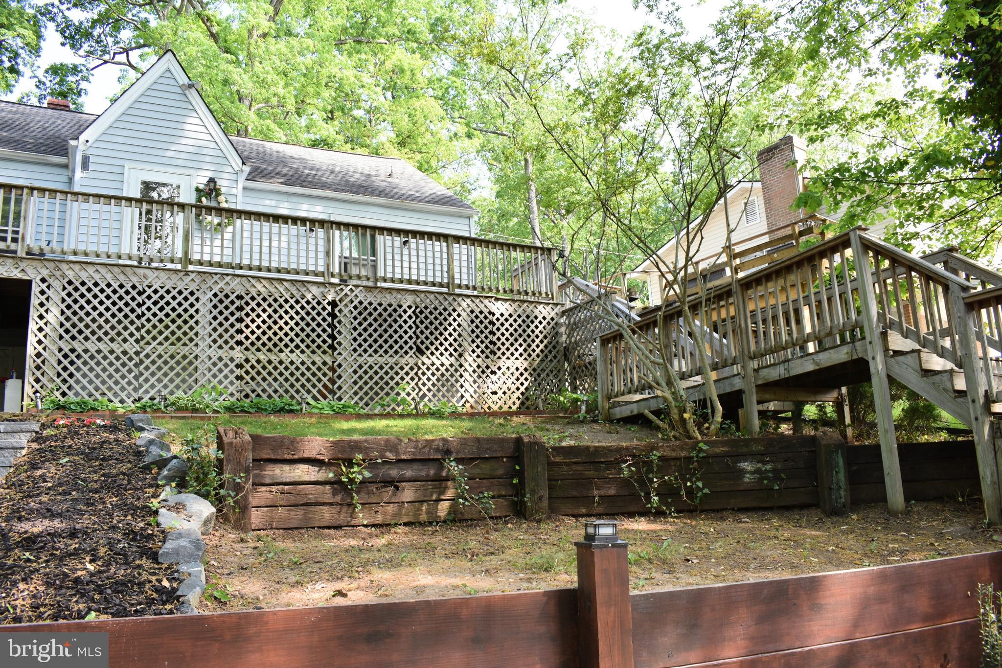 19127 Windsor Road Triangle, VA 22172 - Photo 28 of 33 a front view of a house with a garden