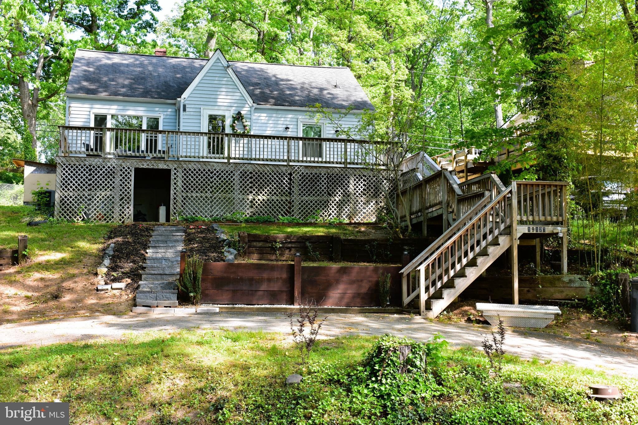 19127 Windsor Road Triangle, VA 22172 - Photo 29 of 33 a house that has a tree in it