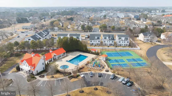 an aerial view of house with yard