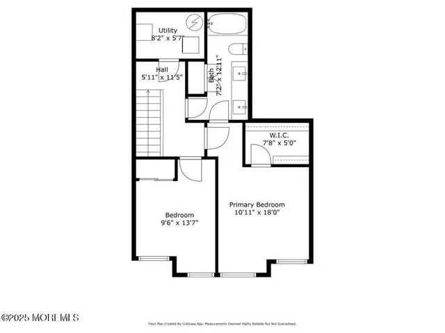 a picture of a bench in front of a wall