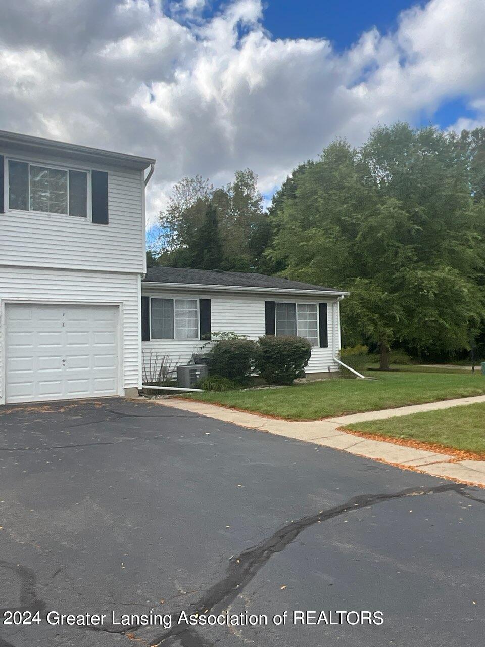 3950 Hunters Ridge Drive, Unit 1 Lansing, MI 48911 - Photo 1 of 16 IMG_0528_