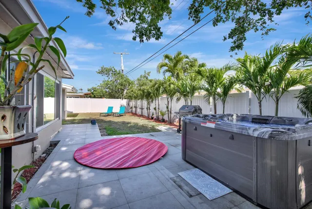 a view of a swimming pool with chairs
