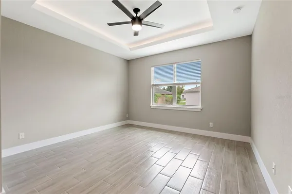 a bathroom with a toilet sink and shower
