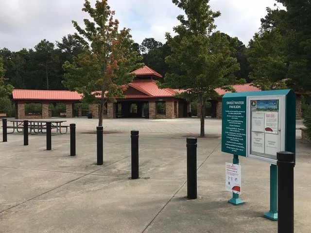 a front view of a building with parking
