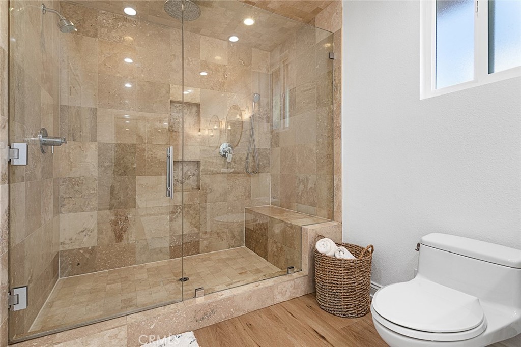 5555 Fairview Place Agoura Hills, CA 91301 - Photo 17 of 39 a bathroom with a shower a toilet and sink