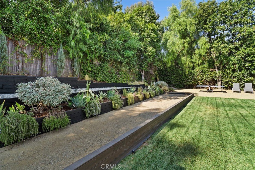 5555 Fairview Place Agoura Hills, CA 91301 - Photo 31 of 39 a view of a backyard with plants