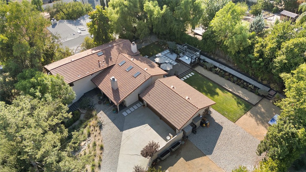 5555 Fairview Place Agoura Hills, CA 91301 - Photo 34 of 39 an aerial view of a house with a yard and trees