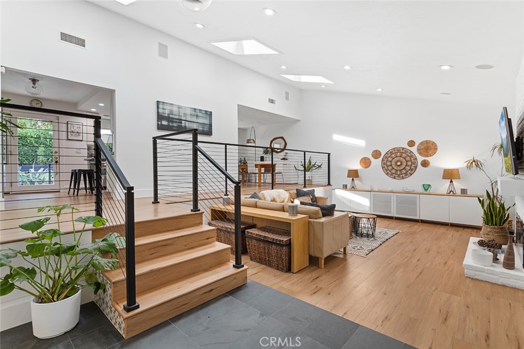 5555 Fairview Place Agoura Hills, CA 91301 - Photo 5 of 39 a living room with furniture and wooden floor