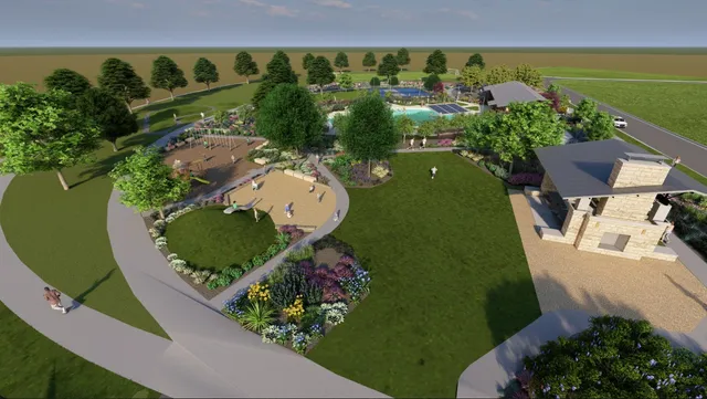 an aerial view of a house with outdoor space