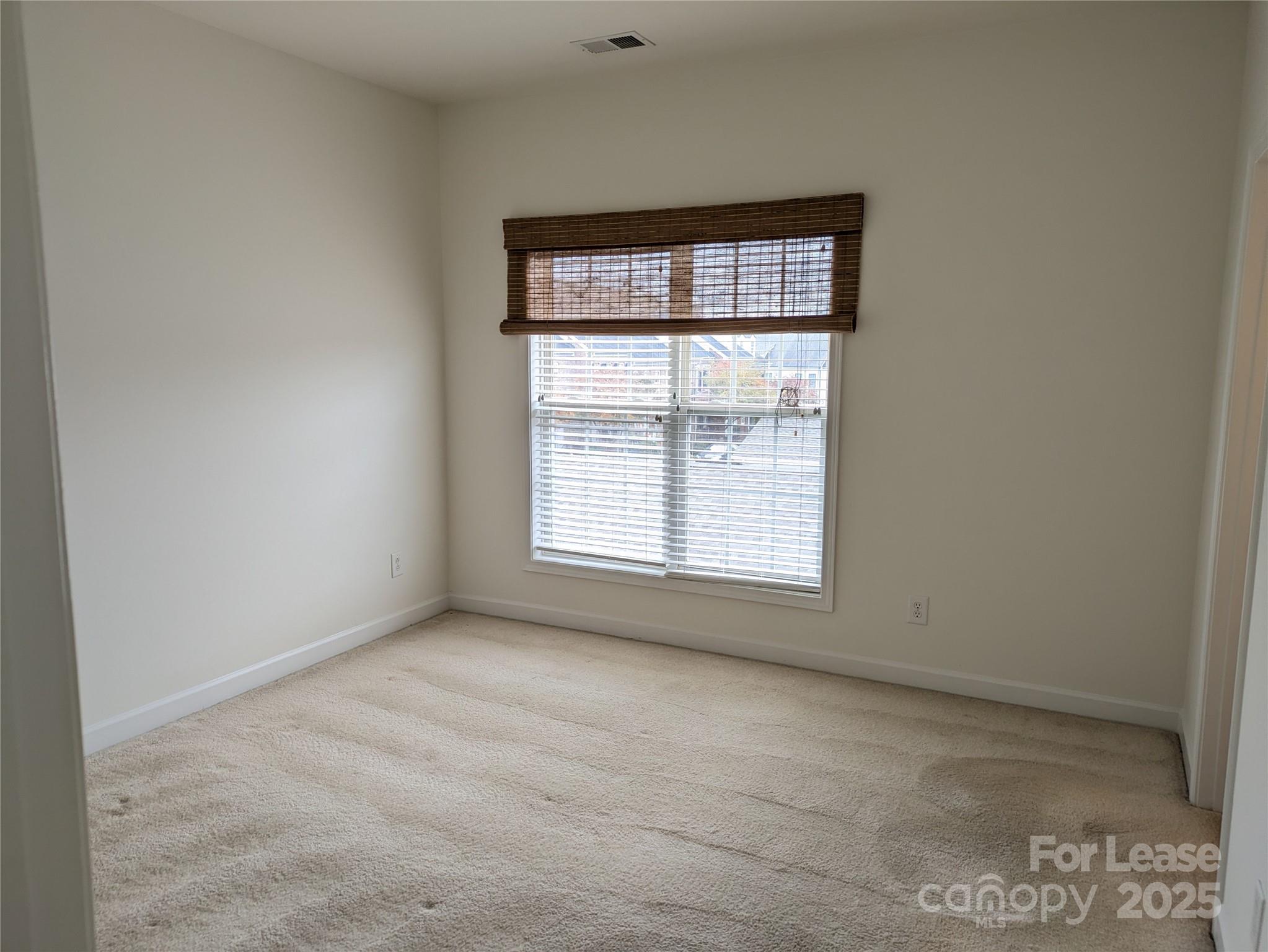 103 Chawton Lane Mooresville, NC 28117 - Photo 16 of 31 a view of an empty room with a window