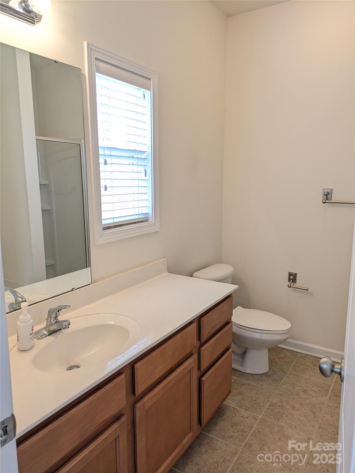 103 Chawton Lane Mooresville, NC 28117 - Photo 18 of 31 a bathroom with a sink toilet and vanity
