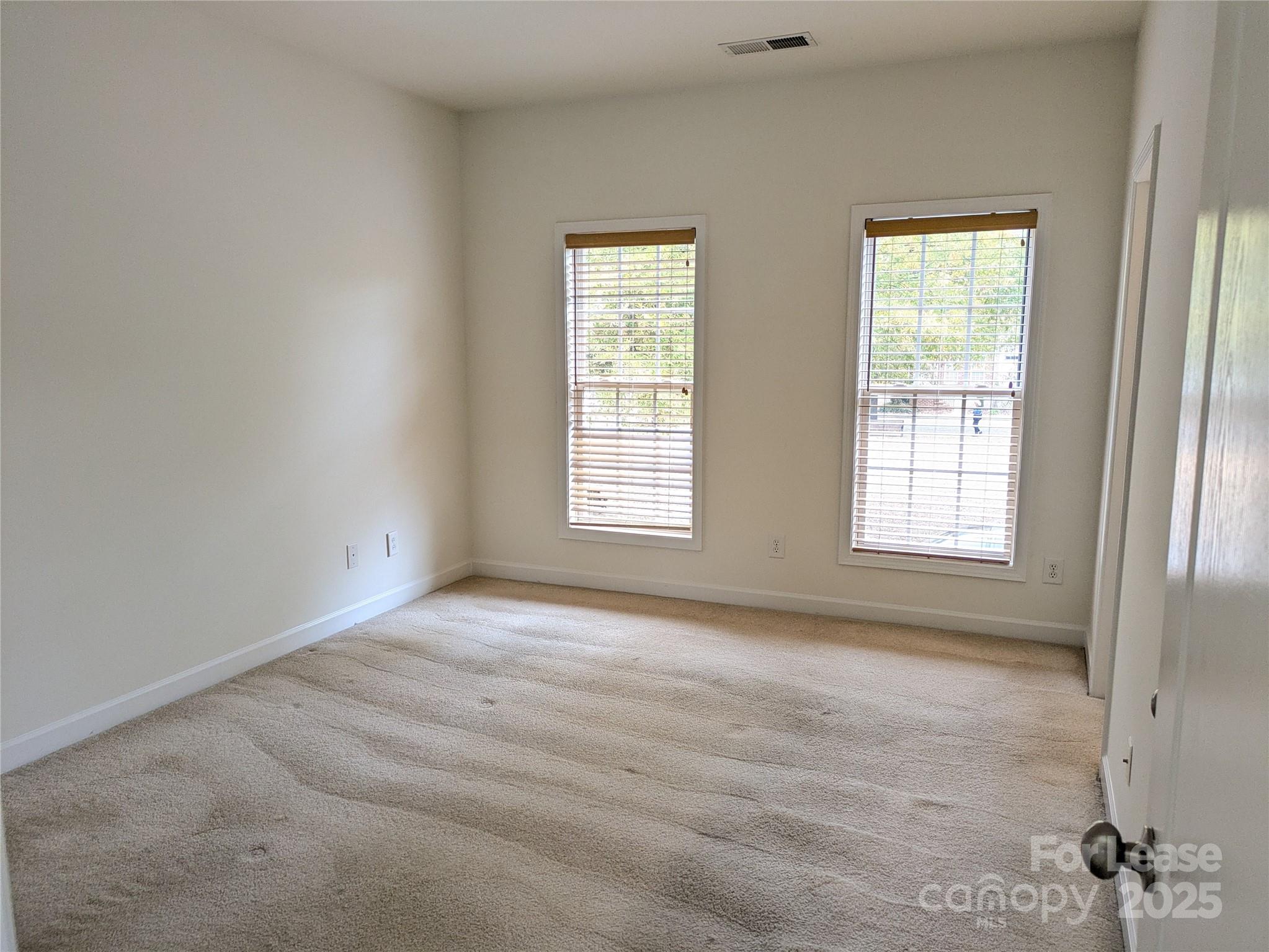 103 Chawton Lane Mooresville, NC 28117 - Photo 22 of 31 a view of an empty room with a window