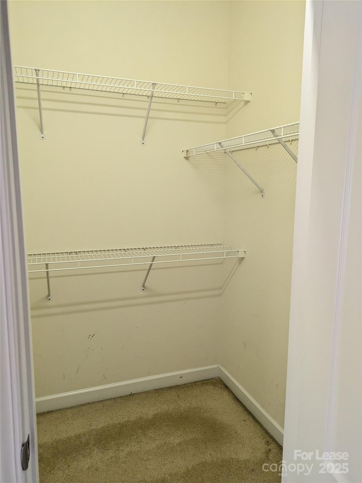 103 Chawton Lane Mooresville, NC 28117 - Photo 26 of 31 a view of a room with racks on the wall