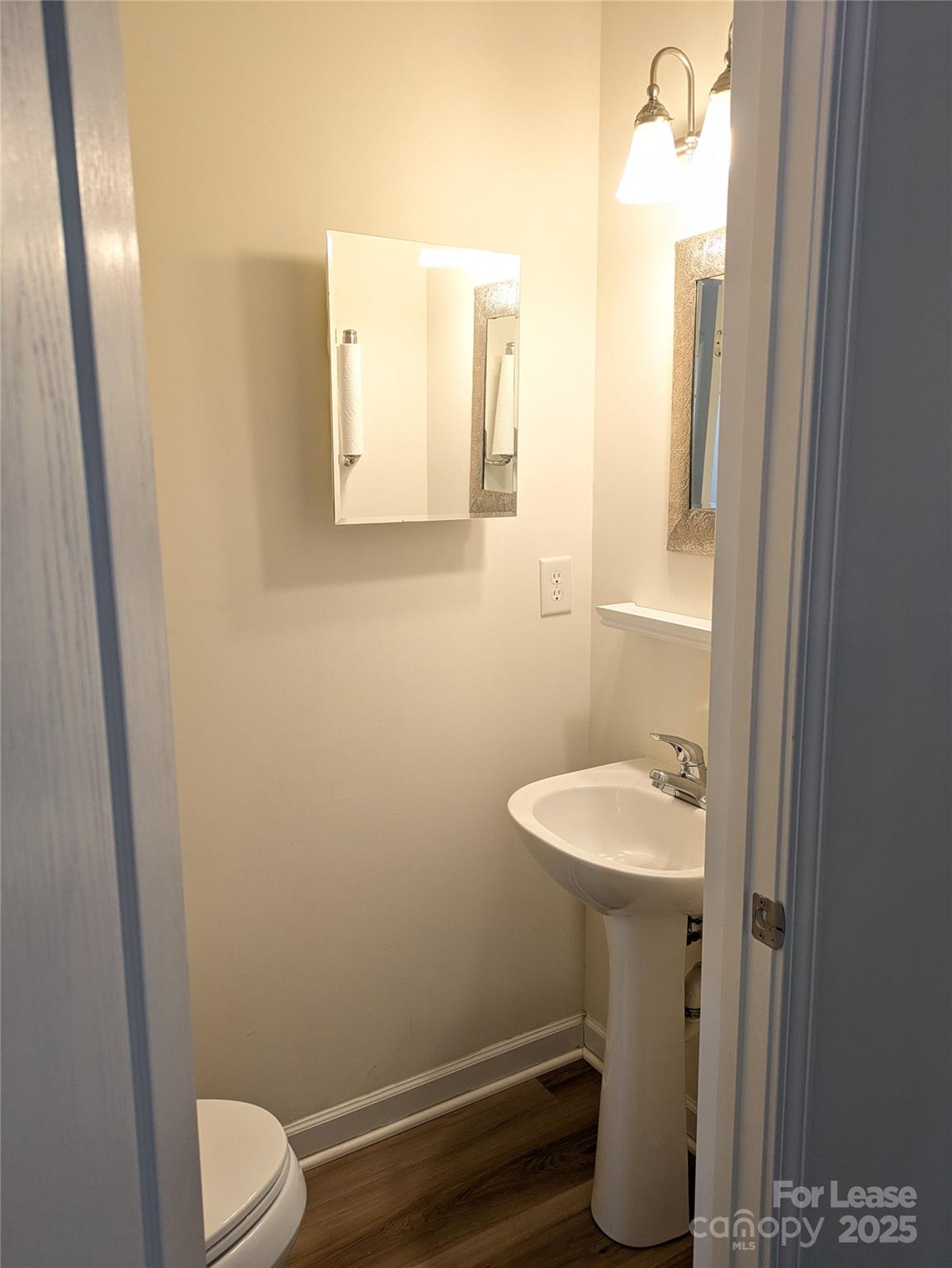 103 Chawton Lane Mooresville, NC 28117 - Photo 7 of 31 a bathroom with a sink toilet and mirror