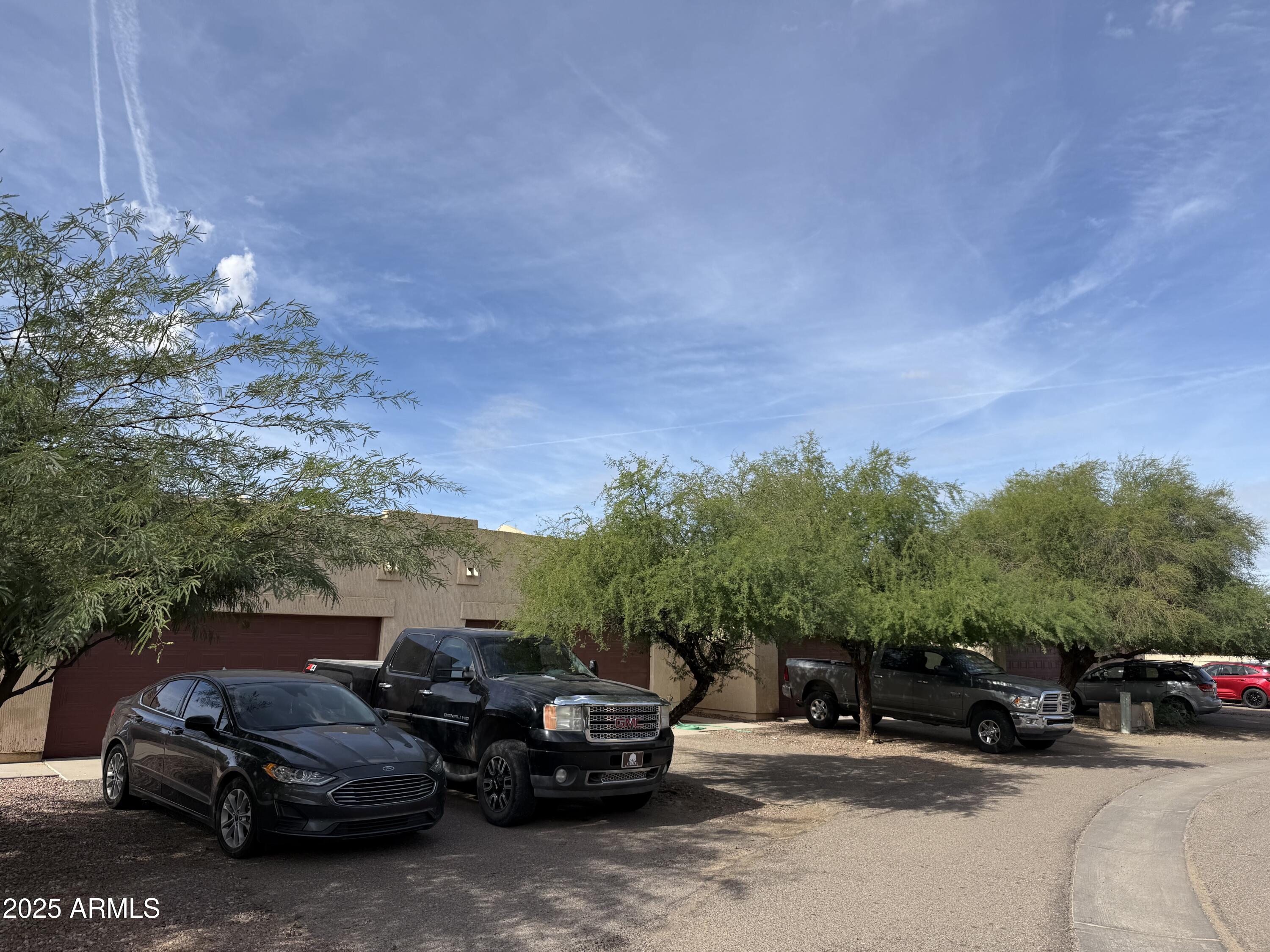 1915 North Ave De Palmas Casa Grande, AZ 85122 - Photo 2 of 24 a view of a cars parked in a parking lot