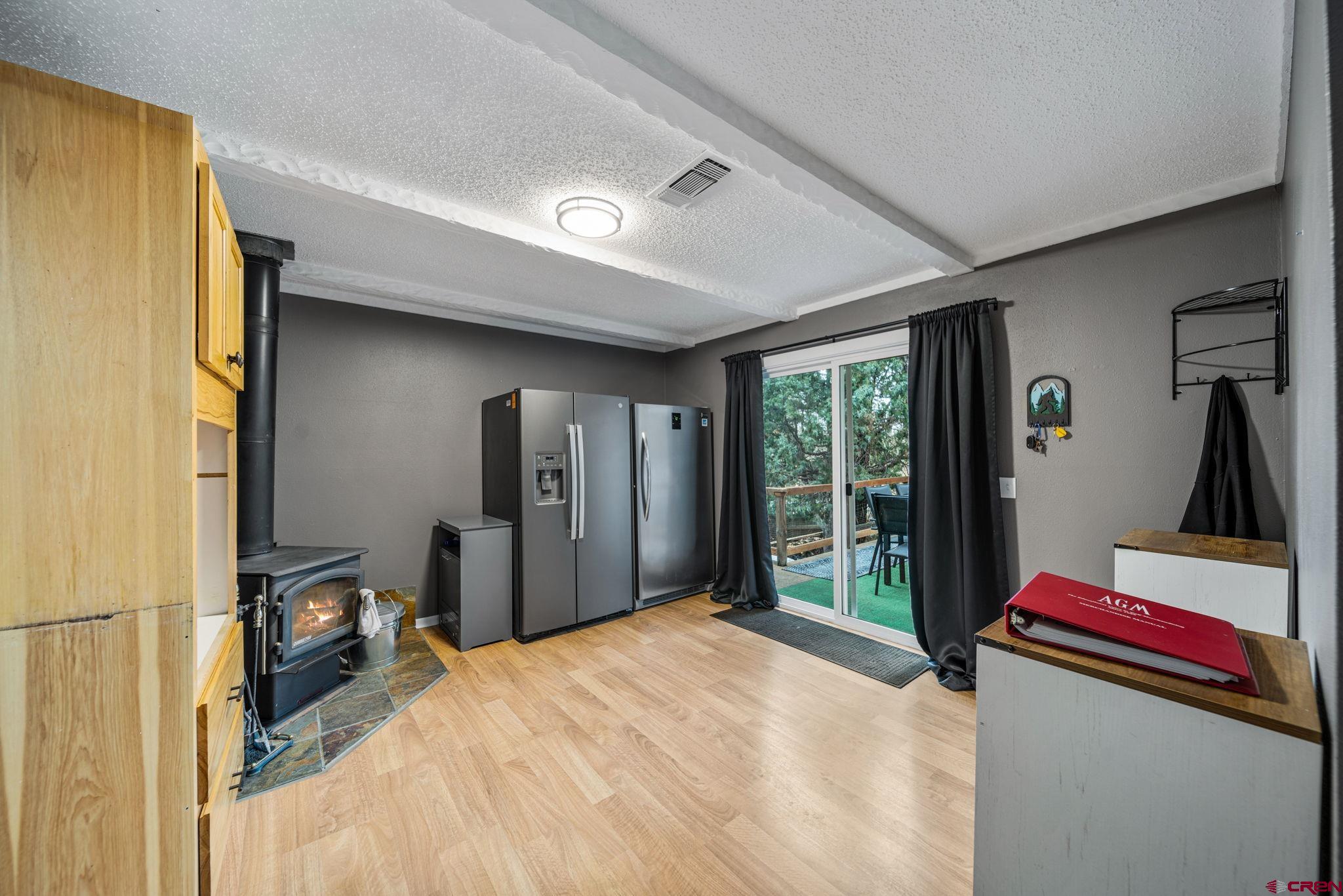 199 Timber Drive Durango, CO 81303 - Photo 17 of 29 a bedroom with a bed and a large window