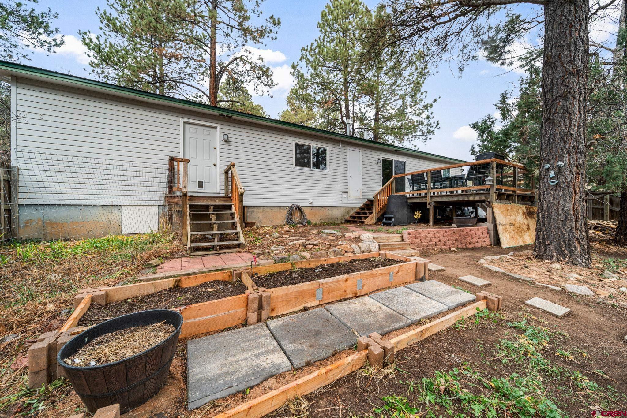 199 Timber Drive Durango, CO 81303 - Photo 28 of 29 a view of a patio with wooden fence