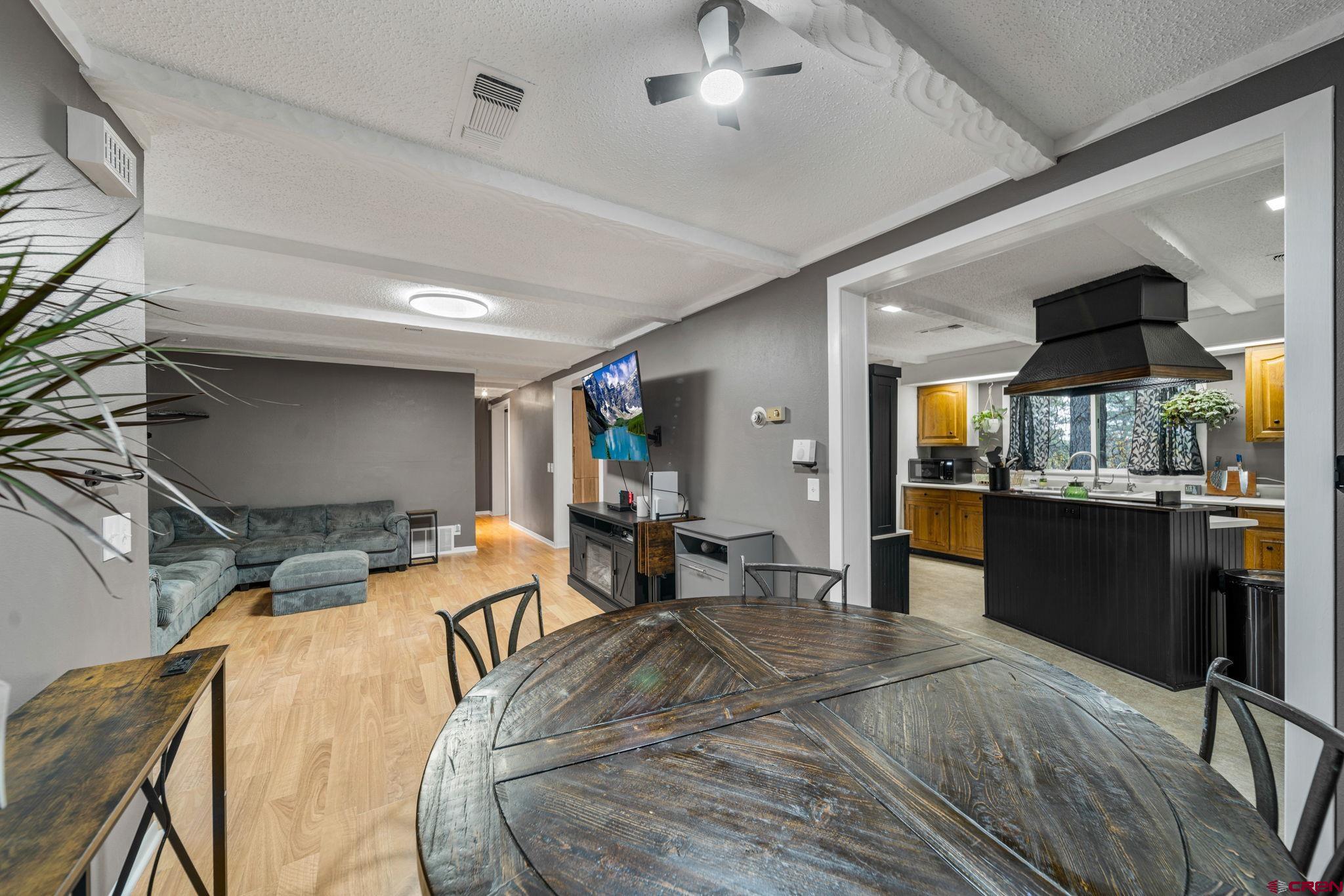 199 Timber Drive Durango, CO 81303 - Photo 8 of 29 a bed room with a bed and a large mirror