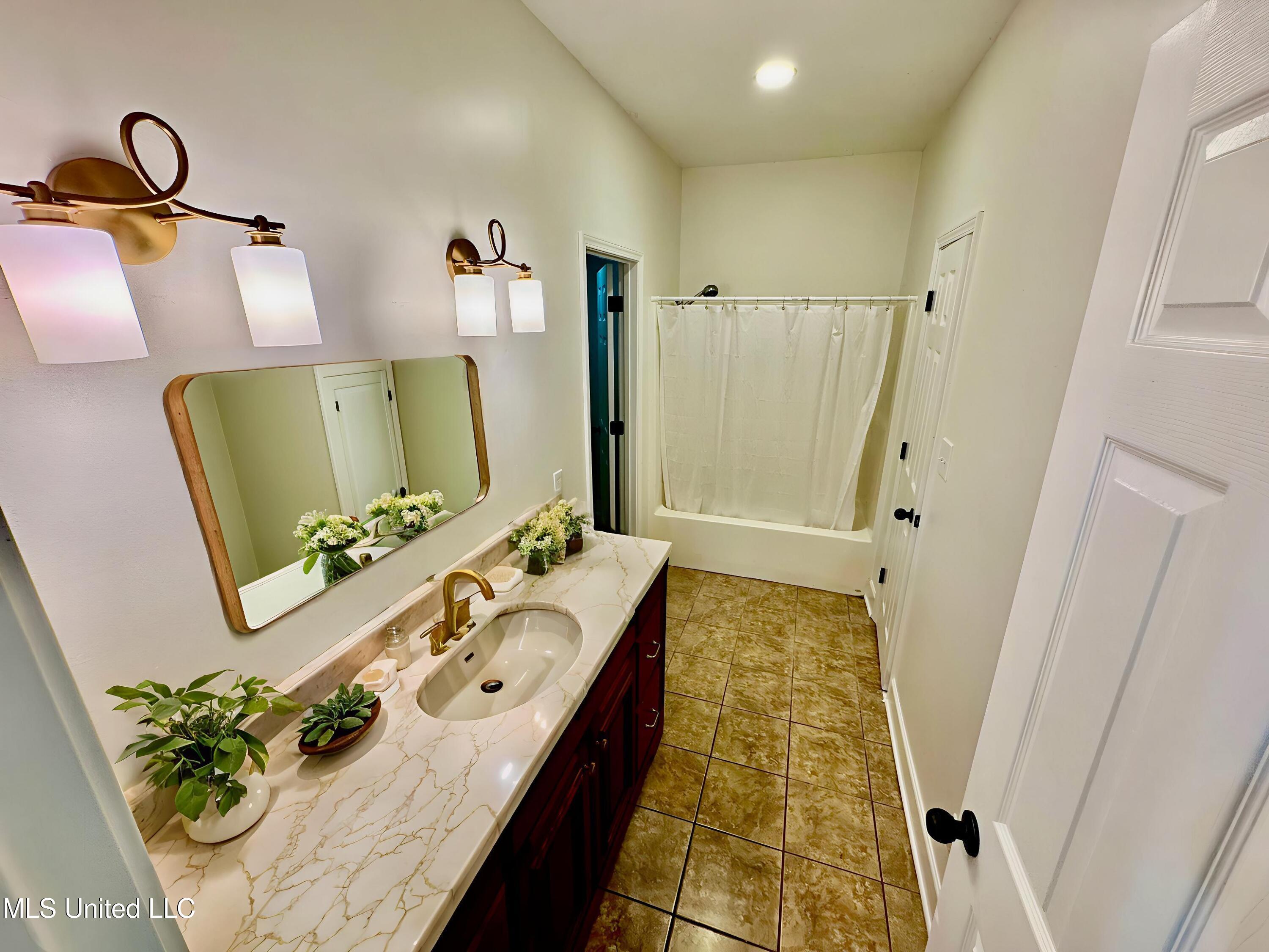 64 Horseshoe Drive Merigold, MS 38759 - Photo 17 of 24 FullSizeRender - Bathroom - Farmhouse -